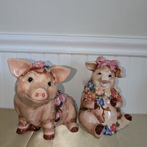 Adorable Pig Figurines with Floral Accents
